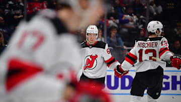 New Jersey Devils left wing Jesper Bratt (63) with center Nico Hischier (13): Gary A. Vasquez-Imagn Images