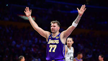 Nov 5, 2025; Los Angeles, California, USA; Los Angeles Lakers guard Luka Doncic (77) reacts after scoring a basket against the San Antonio Spurs during the first half at Crypto.com Arena. Mandatory Credit: Gary A. Vasquez-Imagn Images