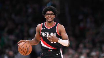 Apr 7, 2024; Boston, Massachusetts, USA; Portland Trail Blazers guard Scoot Henderson (00) dribbles the ball against the Boston Celtics during the first half at TD Garden. Mandatory Credit: Eric Canha-USA TODAY Sports