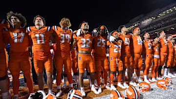 Sep 7, 2024; Champaign, Illinois, USA; Illinois Fighting Illini players celebrate their win over the Kansas Jayhawks  at Memorial Stadium. Mandatory Credit: Ron Johnson-Imagn Images