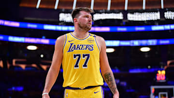Mar 4, 2025; Los Angeles, California, USA; Los Angeles Lakers guard Luka Doncic (77) reacts during the first half at Crypto.com Arena. Mandatory Credit: Gary A. Vasquez-Imagn Images