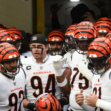 Dec 23, 2023; Pittsburgh, Pennsylvania, USA;  Cincinnati Bengals defensive end Sam Hubbard (94) gets ready to put on his helmet as they prepare to play the Pittsburgh Steelers at Acrisure Stadium. Mandatory Credit: Philip G. Pavely-USA TODAY Sports