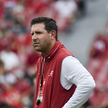 Alabama offensive coordinator and quarterbacks coach Nick Sheridan watches his quarterbacks warm up at Bryant-Denny Stadium before a game against the South Florida Bulls. 