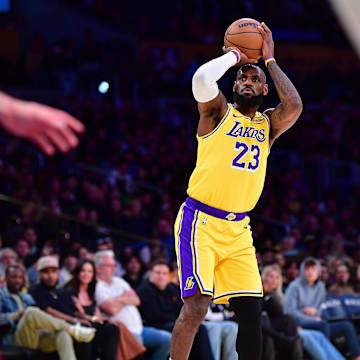 Dec 31, 2024; Los Angeles, California, USA; Los Angeles Lakers forward LeBron James (23) shoots against the Cleveland Cavaliers during the first half at Crypto.com Arena. Mandatory Credit: Gary A. Vasquez-Imagn Images