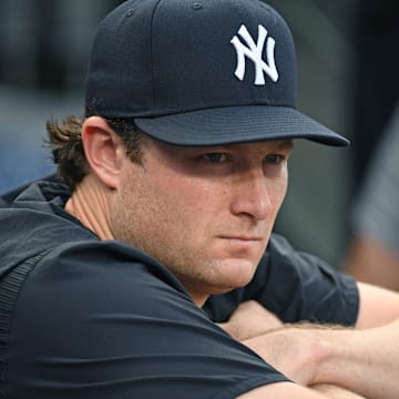 Jul 29, 2024; Philadelphia, Pennsylvania, USA; New York Yankees pitcher Gerrit Cole (45) in the dugout against the Philadelphia Phillies at Citizens Bank Park. Mandatory Credit: Eric Hartline-Imagn Images