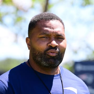 Jun 10, 2024; Foxborough, MA, USA; New England Patriots head coach Jerod Mayo walks to the microphones for to hold a press conference at minicamp at Gillette Stadium. Mandatory Credit: Eric Canha-USA TODAY Sports