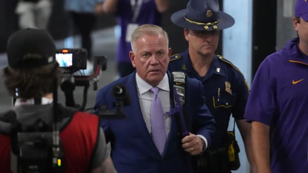  LSU Tigers coach Brian Kelly arrives before the game against the Southern California Trojans