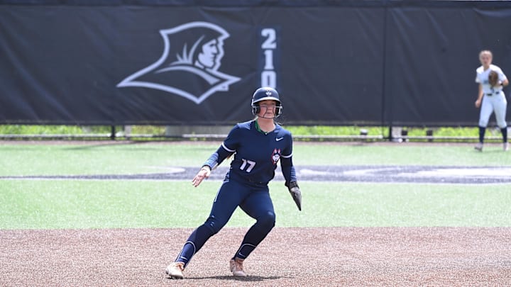 May 10, 2024; Providence, RI, USA; UConn Huskies catcher Grace Jenkins (17) runs back to second base during the BIG EAST Softball Tournament against the Villanova Wildcats at Glay Field. Mandatory Credit: Eric Canha-Imagn Images
