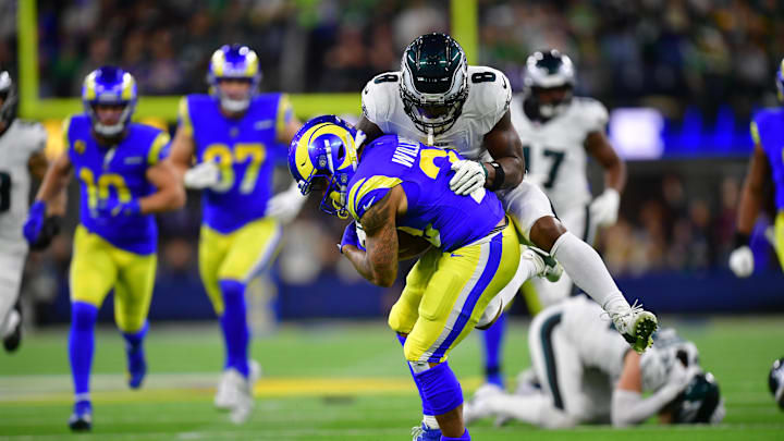 Nov 24, 2024; Inglewood, California, USA;  Philadelphia Eagles safety C.J. Gardner-Johnson (8) tackles Los Angeles Rams running back Kyren Williams (23) during the first half at SoFi Stadium. Mandatory Credit: Gary A. Vasquez-Imagn Images