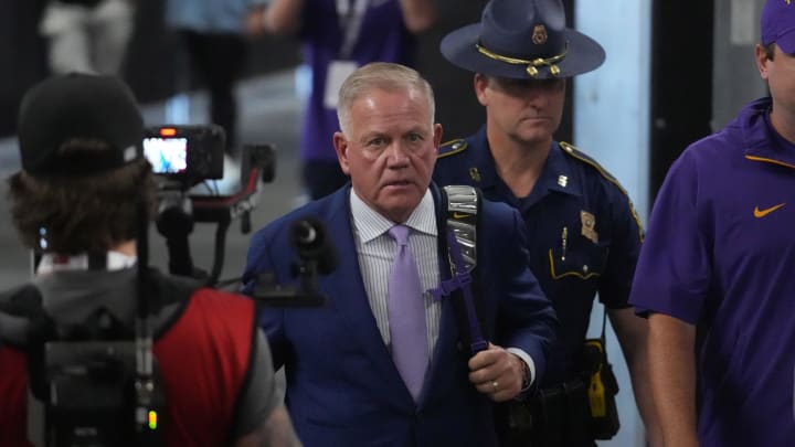 Sep 1, 2024; Paradise, Nevada, USA; LSU Tigers coach Brian Kelly arrives before the game against the Southern California Trojans  at Allegiant Stadium. Mandatory Credit: Kirby Lee-USA TODAY Sports