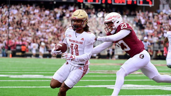 Sep 16, 2023; Chestnut Hill, Massachusetts, USA; Boston College Eagles wide receiver Lewis Bond (11) beats Florida State Seminoles defensive back Fentrell Cypress II (23) to the end zone for a touchdown during the first half at Alumni Stadium. Mandatory Credit: Eric Canha-USA TODAY Sports