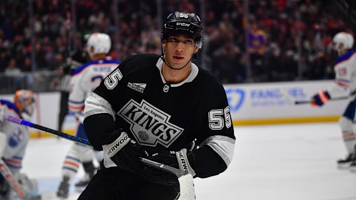 Dec 28, 2024; Los Angeles, California, USA; Los Angeles Kings right wing Quinton Byfield (55) reacts after scoring a goal against the Edmonton Oilers during the overtime period at Crypto.com Arena. Mandatory Credit: Gary A. Vasquez-Imagn Images