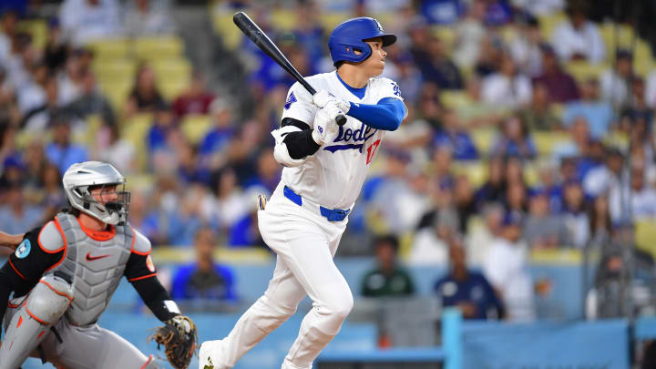 Aug 29, 2024; Los Angeles, California, USA; Los Angeles Dodgers designated hitter Shohei Ohtani (17) runs out a ground ball against the Baltimore Orioles during the first inning at Dodger Stadium.