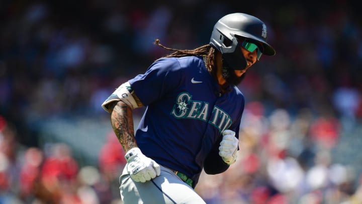 Seattle Mariners shortstop J.P. Crawford (3) reacts after hitting a solo home run against the Los Angeles Angels during the sixth inning at Angel Stadium in 2024.