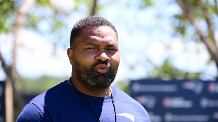 Jun 10, 2024; Foxborough, MA, USA; New England Patriots head coach Jerod Mayo walks to the microphones for to hold a press conference at minicamp at Gillette Stadium. Mandatory Credit: Eric Canha-USA TODAY Sports