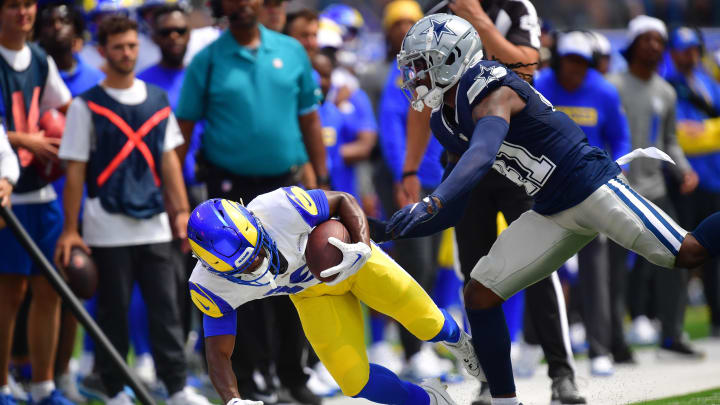 Aug 11, 2024; Inglewood, California, USA; Los Angeles Rams wide receiver Xavier Smith (19) is pushed out of bounds by Dallas Cowboys cornerback Caelen Carson (41) during the first half at SoFi Stadium. Mandatory Credit: Gary A. Vasquez-USA TODAY Sports