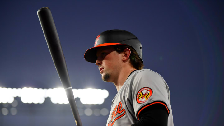 Aug 27, 2024; Los Angeles, California, USA; Baltimore Orioles catcher Adley Rutschman (35) on deck before hitting against the Los Angeles Dodgers during the third inning at Dodger Stadium. Mandatory Credit: Gary A. Vasquez-USA TODAY Sports