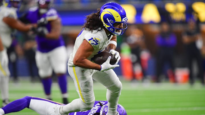 Los Angeles Rams wide receiver Puka Nacua runs with the ball against the Minnesota Vikings. Los Angeles Rams wide receiver Puka Nacua runs with the ball against the Minnesota Vikings.