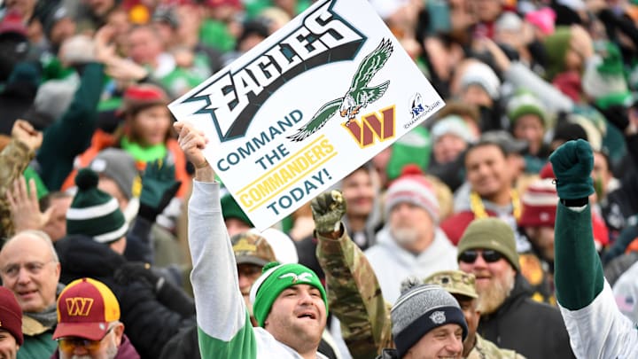 Philadelphia Eagles fans hold up signs during the first half in the NFC championship game.