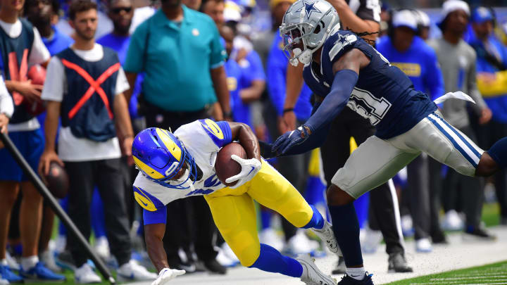 Aug 11, 2024; Inglewood, California, USA; Los Angeles Rams wide receiver Xavier Smith (19) is pushed out of bounds by Dallas Cowboys cornerback Caelen Carson (41) during the first half at SoFi Stadium. Mandatory Credit: Gary A. Vasquez-USA TODAY Sports