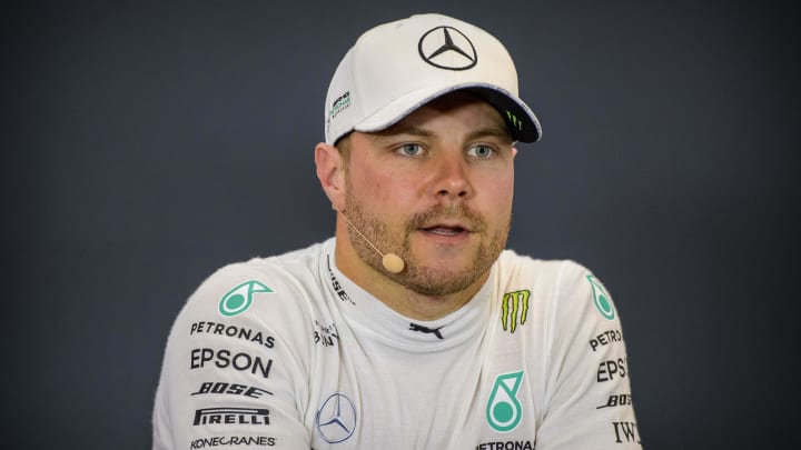 Nov 2, 2019; Austin, TX, USA; Mercedes AMG Petronas Motorsport driver Valtteri Bottas (77) of Finland speaks to the media after winning pole position in qualifying for the United States Grand Prix at Circuit of the Americas. Mandatory Credit: Jerome Miron-USA TODAY Sports