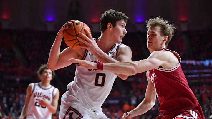 Feb 15, 2026; Champaign, Illinois, USA;  Illinois Fighting Illini forward David Mirkovic (0) looks to pass as Indiana Hoosiers forward Reed Bailey (1) defends during the second half at State Farm Center. Mandatory Credit: Ron Johnson-Imagn Images