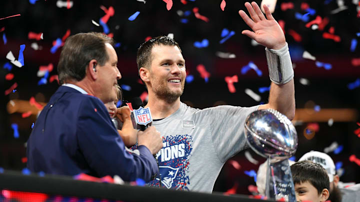 Feb 3, 2019; Atlanta, GA, USA; New England Patriots quarterback Tom Brady (12) with the Vince Lombardi Trophy after winning Super Bowl LIII against the Los Angeles Rams at Mercedes-Benz Stadium.