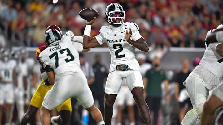 Sep 20, 2025; Los Angeles, California, USA; Michigan State Spartans quarterback Aidan Chiles (2) throws against the Southern California Trojans during the first half at the Los Angeles Memorial Coliseum. Mandatory Credit: Gary A. Vasquez-Imagn Images Sep 20, 2025; Los Angeles, California, USA; Michigan State Spartans quarterback Aidan Chiles (2) throws against the Southern California Trojans during the first half at the Los Angeles Memorial Coliseum. Mandatory Credit: Gary A. Vasquez-Imagn Images