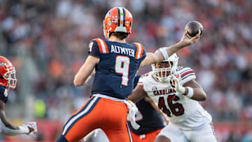 Dec 31, 2024; Orlando, FL, USA; Illinois Fighting Illini quarterback Luke Altmyer (9) throws the ball against the South Carolina Gamecocks in the third quarter at Camping World Stadium.