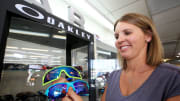 Andrea Finlay holds up some of the most popular brands of Oakley sunglasses that they offer for sale July 19, 2022, at Harley's Bicycles, 629 N. Main St.

Hut Harleys Bicycles New Owner 07