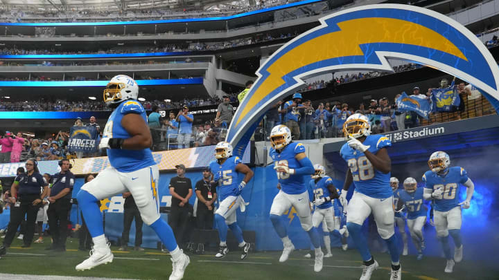 Oct 29, 2023; Inglewood, California, USA; Los Angeles Chargers offensive tackle Trey Pipkins III (79), linebacker Tuli Tuipulotu (45), quarterback Justin Herbert (10) and running back Isaiah Spiller (28) enter the field before the game against the Chicago Bears at SoFi Stadium. Mandatory Credit: Kirby Lee-USA TODAY Sports