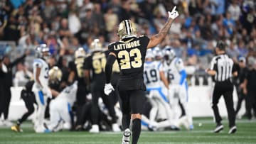 Sep 18, 2023; Charlotte, North Carolina, USA; New Orleans Saints cornerback Marshon Lattimore (23) signals a turnover by Carolina Panthers in the second quarter at Bank of America Stadium. Mandatory Credit: Bob Donnan-USA TODAY Sports