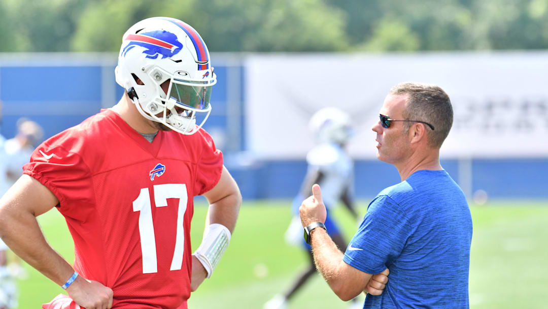 Jul 28, 2021; Orchard Park, NY, United States; Buffalo Bills general manager Brandon Beane has a word with quarterback Josh Allen (17) after practice at the Buffalo Bills Training Facility. Mandatory Credit: Mark Konezny-Imagn Images
