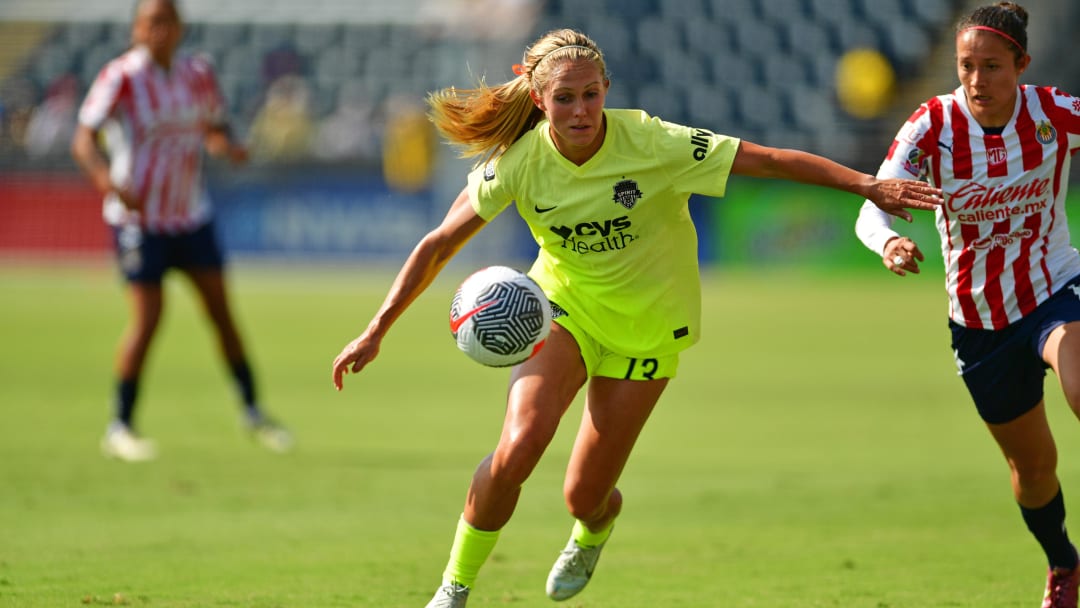 Jul 21, 2024; Washington, District of Columbia, USA; Washington Spirit forward Brittany Ratcliffe (13) races after the ball during the first half against Chivas de Guadalajara at Audi Field. Mandatory Credit: Caean Couto-USA TODAY Sports