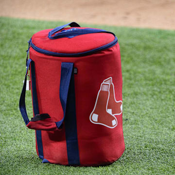 Apr 29, 2021; Arlington, Texas, USA; A view of the Boston Red Sox logo and a field bag during batting practice before the game between the Texas Rangers and the Boston Red Sox at Globe Life Field. Mandatory Credit: Jerome Miron-Imagn Images