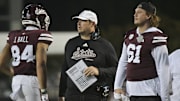 Mississippi State Bulldogs head coach Jeff Lebby speaks with players during the fourth quarter against the Massachusetts Minutemen at Davis Wade Stadium at Scott Field.