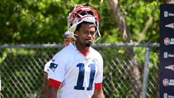 Jun 10, 2024; Foxborough, MA, USA; New England Patriots wide receiver Tyquan Thornton (11) walks to the practice fields for minicamp at Gillette Stadium. Mandatory Credit: Eric Canha-USA TODAY Sports