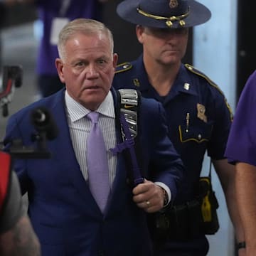 Sep 1, 2024; Paradise, Nevada, USA; LSU Tigers coach Brian Kelly arrives before the game against the Southern California Trojans  at Allegiant Stadium. Mandatory Credit: Kirby Lee-Imagn Images