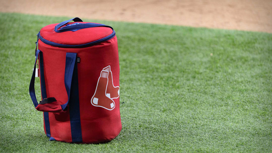 Apr 29, 2021; Arlington, Texas, USA; A view of the Boston Red Sox logo and a field bag during batting practice before the game between the Texas Rangers and the Boston Red Sox at Globe Life Field. Mandatory Credit: Jerome Miron-Imagn Images