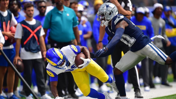 Aug 11, 2024; Inglewood, California, USA; Los Angeles Rams wide receiver Xavier Smith (19) is pushed out of bounds by Dallas Cowboys cornerback Caelen Carson (41) during the first half at SoFi Stadium. 