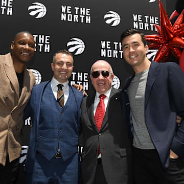 Jun 13, 2023; Toronto, Ontario, Canada;  Toronto Raptors new head coach Darko Rajakovic (second left) poses for a photo with (from left) team president Masai Ujiri, team co-owner Larry Tanenbaum and general manager Bobby Webster during an introductory media conference at Scotiabank Arena. Mandatory Credit: Dan Hamilton-Imagn Images