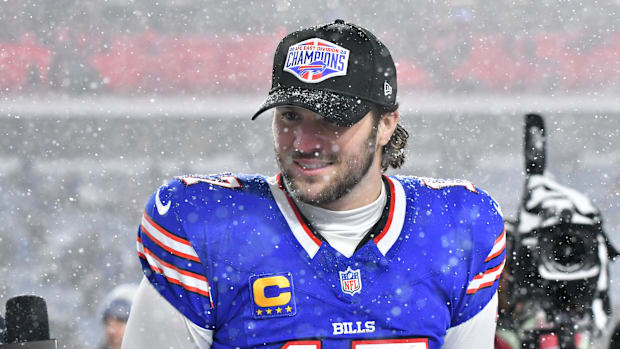 Josh Allen wears an AFC East Champion Ha