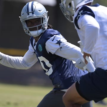 Dallas Cowboys defensive back Charvarius Ward defends against receiver Ricky Jeune during training camp.
