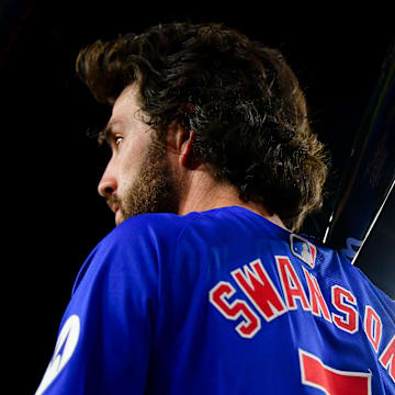 Sep 9, 2024; Los Angeles, California, USA; Chicago Cubs shortstop Dansby Swanson (7) on deck before hitting against the Los Angeles Dodgers during the fourth inning at Dodger Stadium