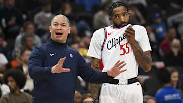 Nov 2, 2024; Inglewood, California, USA; LA Clippers head coach Tyronn Lue reacts with forward Derrick Jones Jr. (55) against the Oklahoma City Thunder during the second half at Intuit Dome. Mandatory Credit: Jonathan Hui-Imagn Images