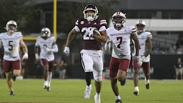 Nov 2, 2024; Starkville, Mississippi, USA; Mississippi State Bulldogs running back Xavier Gayten (22) runs the ball against the Massachusetts Minutemen during the fourth quarter at Davis Wade Stadium at Scott Field. Mandatory Credit: Matt Bush-Imagn Images