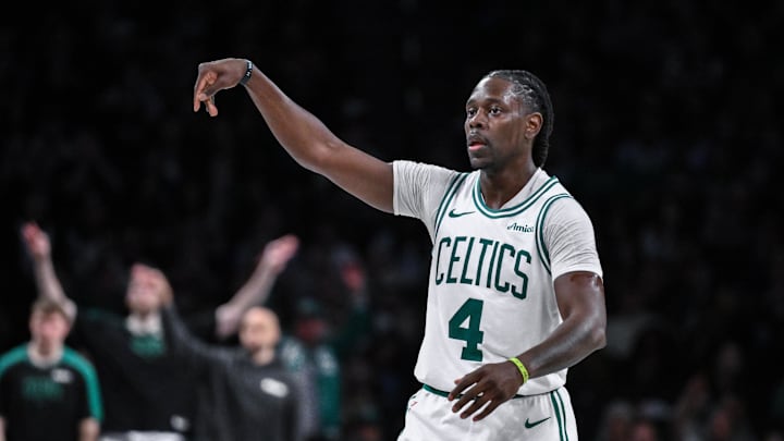 Mar 15, 2025; Brooklyn, New York, USA; Boston Celtics guard Jrue Holiday (4) reacts after making a three point shot ]against the Brooklyn Nets during the second half at Barclays Center. Mandatory Credit: John Jones-Imagn Images