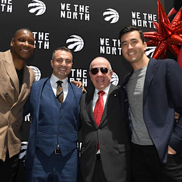 Jun 13, 2023; Toronto, Ontario, Canada;  Toronto Raptors new head coach Darko Rajakovic (second left) poses for a photo with (from left) team president Masai Ujiri, team co-owner Larry Tanenbaum and general manager Bobby Webster during an introductory media conference at Scotiabank Arena. Mandatory Credit: Dan Hamilton-Imagn Images