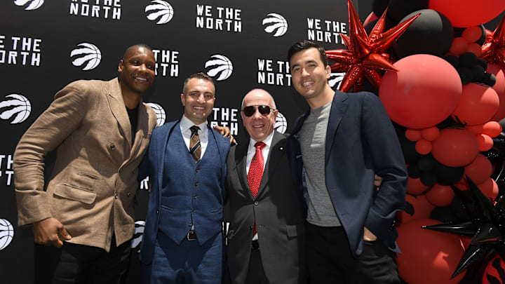 Jun 13, 2023; Toronto, Ontario, Canada;  Toronto Raptors new head coach Darko Rajakovic (second left) poses for a photo with (from left) team president Masai Ujiri, team co-owner Larry Tanenbaum and general manager Bobby Webster during an introductory media conference at Scotiabank Arena. Mandatory Credit: Dan Hamilton-Imagn Images