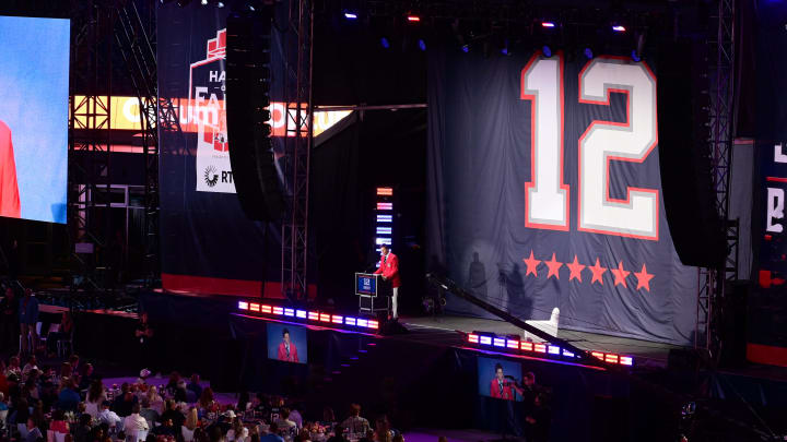 Jun 12, 2024; Foxborough, MA, USA; Former quarterback Tom Brady speaks during his New England Patriots Hall of Fame induction ceremony at Gillette Stadium.  Mandatory Credit: Eric Canha-USA TODAY Sports